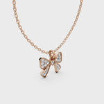 Load and play video in Gallery viewer, Cutesy Bow Pendant